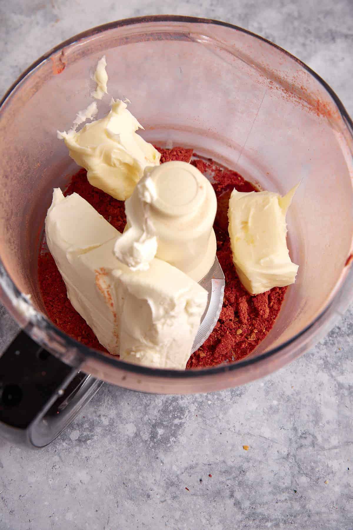 Cream cheese added to dried strawberries.