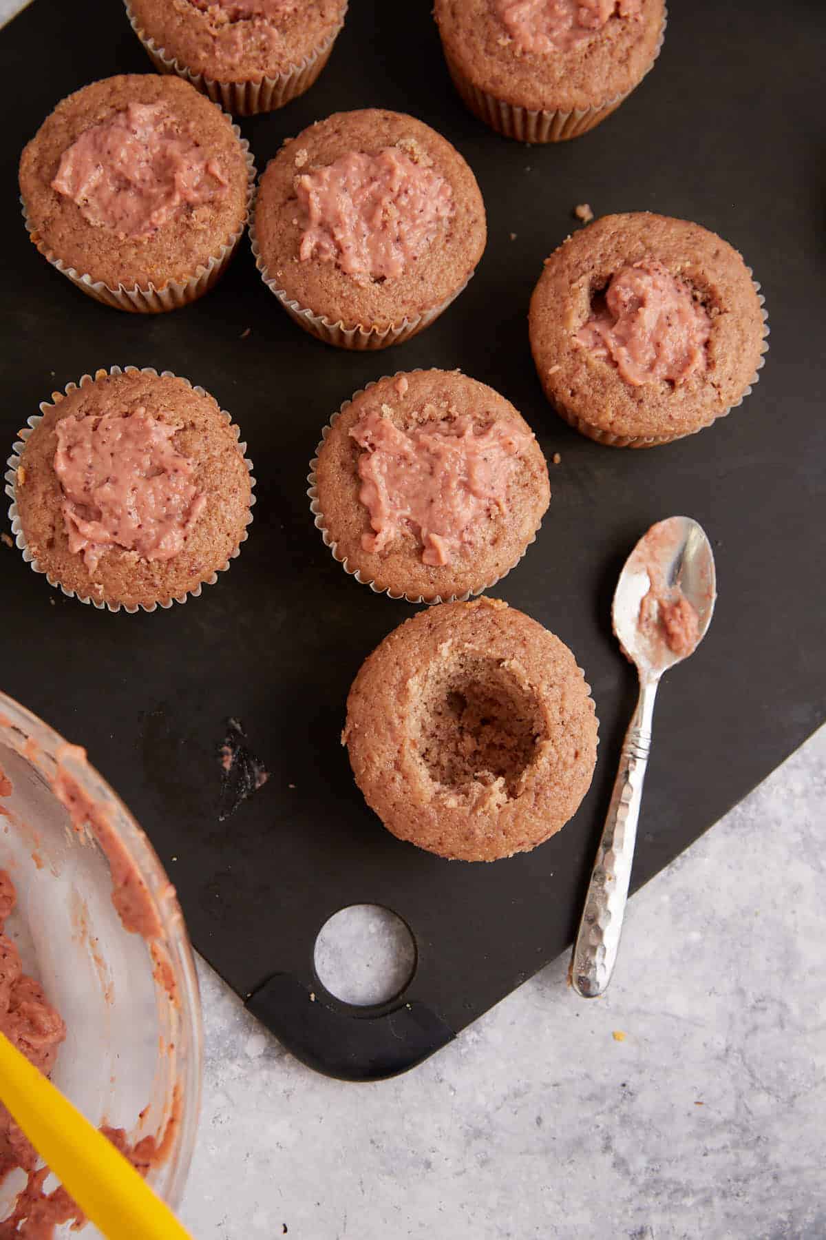 Cupcakes filled with a strawberry filling.