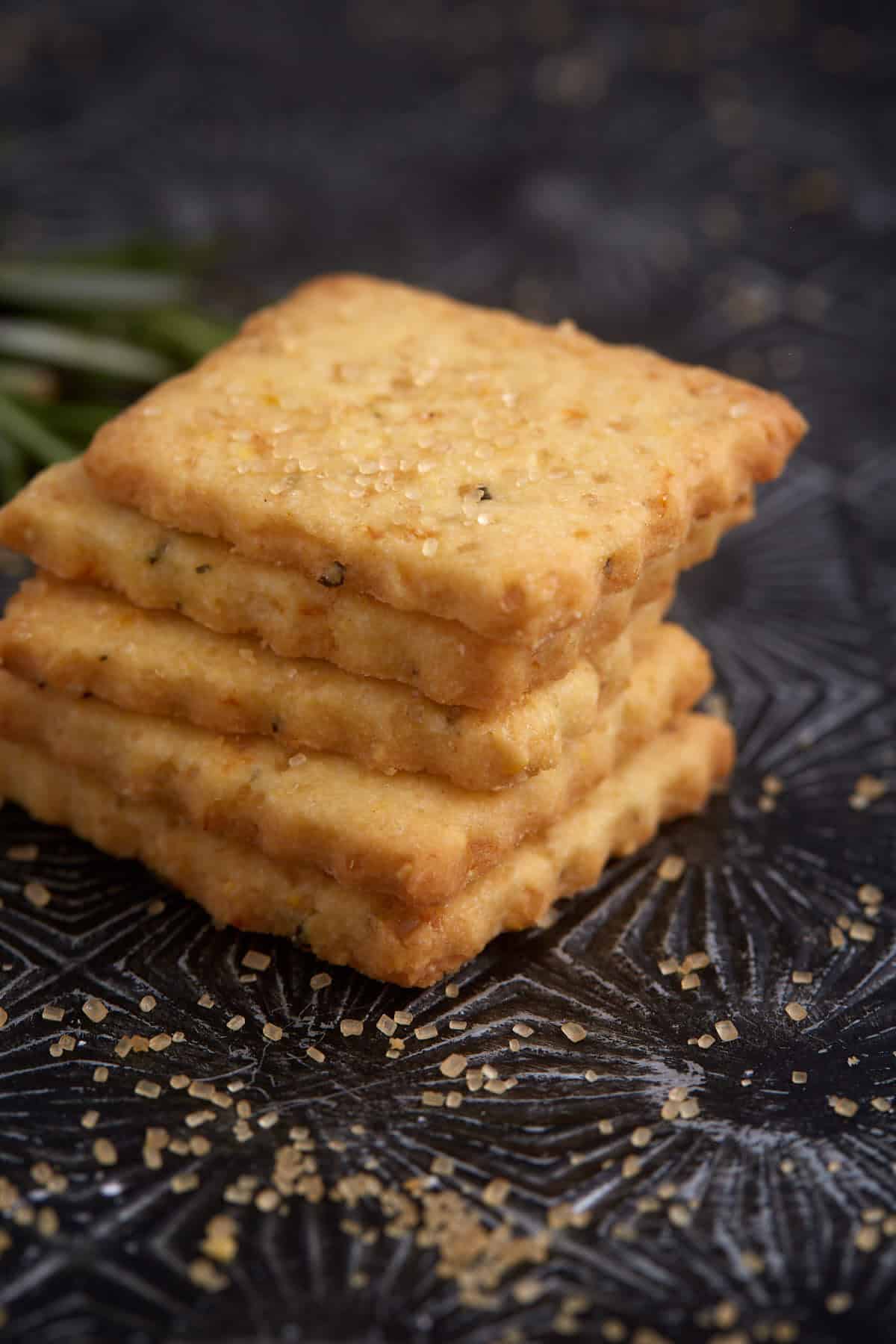 A stack of orange shortbread cookies.
