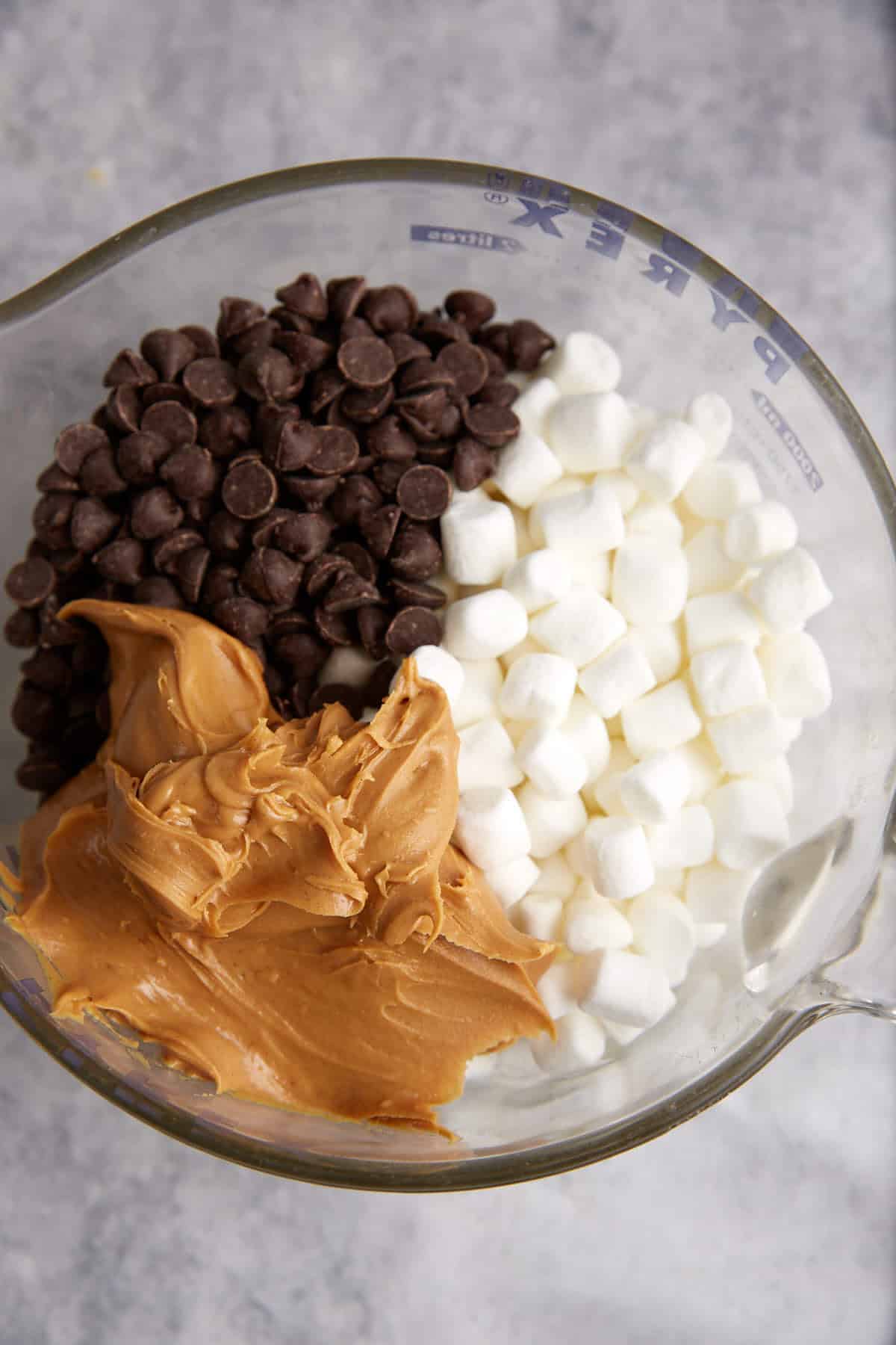 A bowl of peanut butter, chocolate chips and peanut butter.