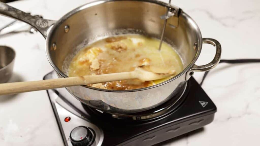 Butter and brown sugar in a saucepan.