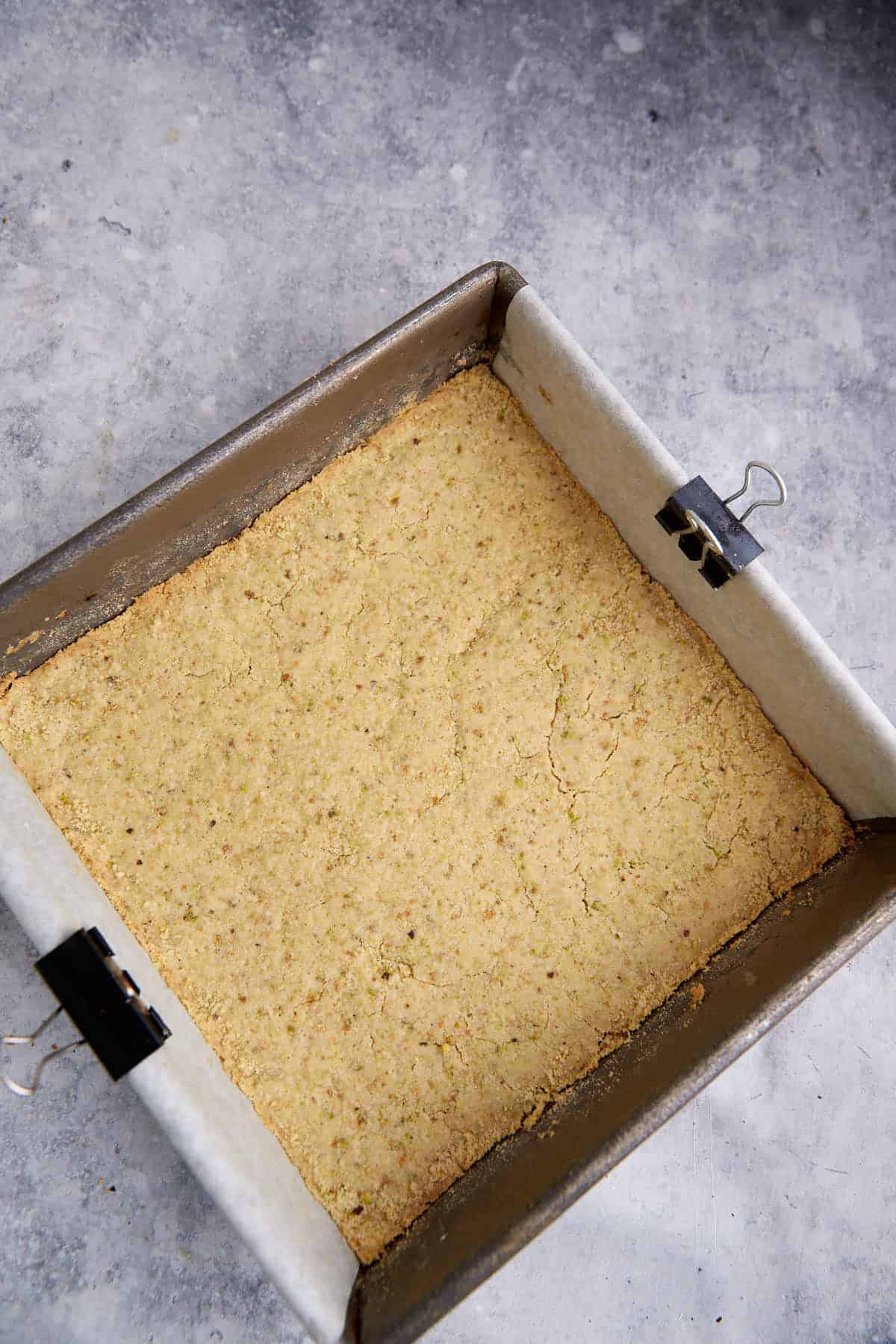A baked pistachio shortbread crust.