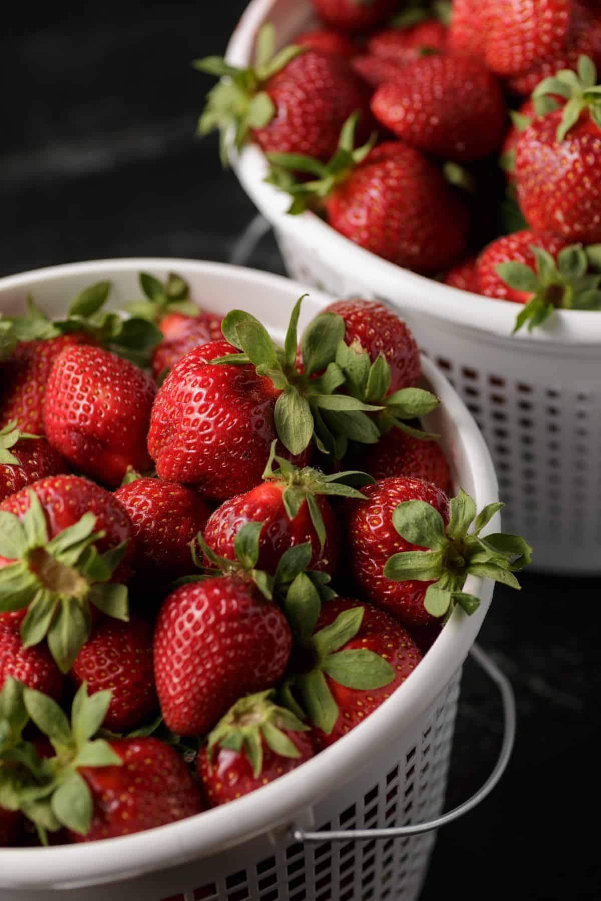 Two baskets of strawberries.