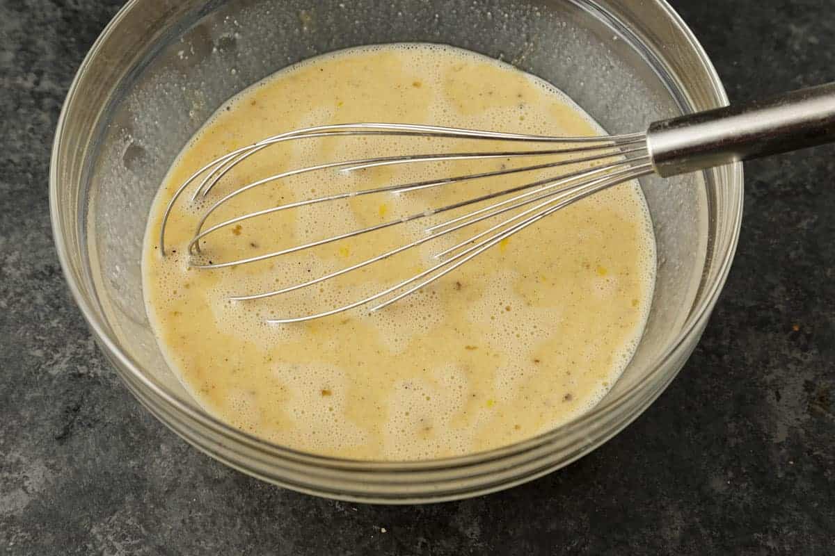Custard for bread pudding in a bowl.