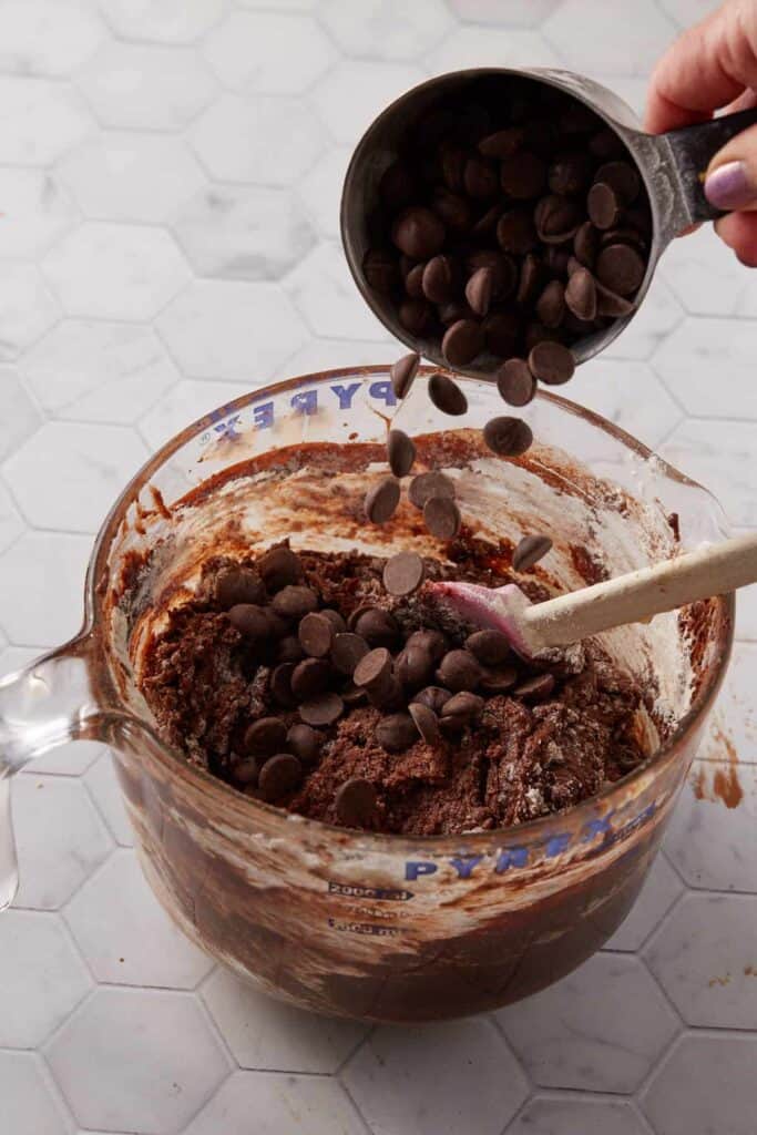 Chocolate chips added to the brownie batter.