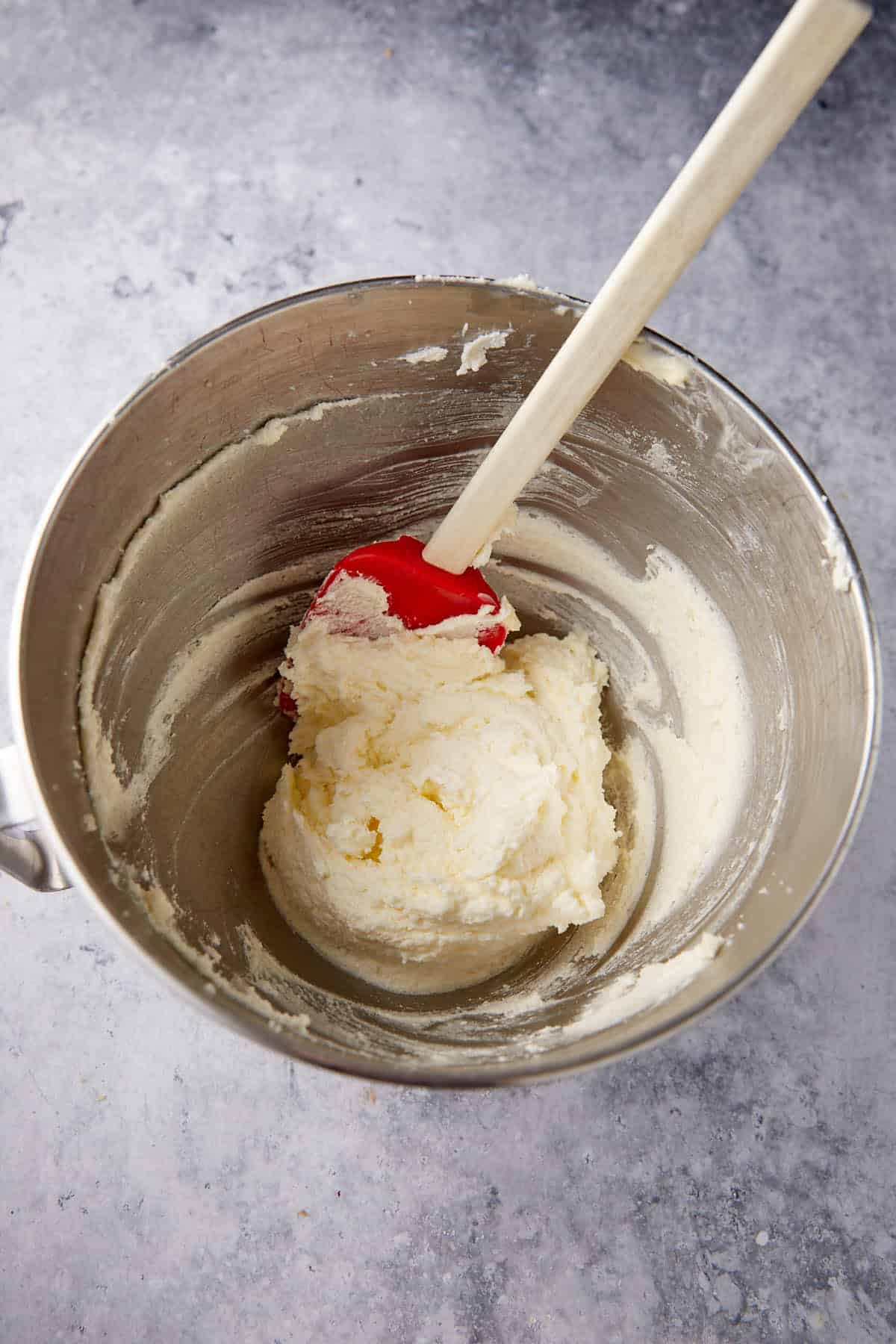 butter adn sugar creamed in a bowl. 