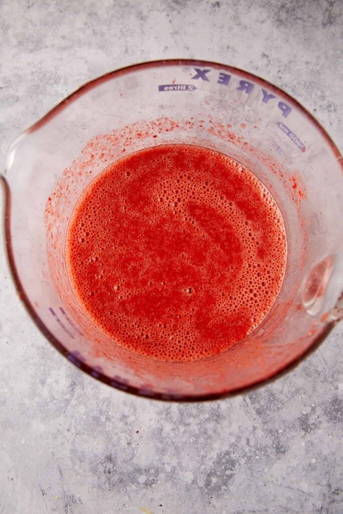 Pureed strawberries in a bowl.