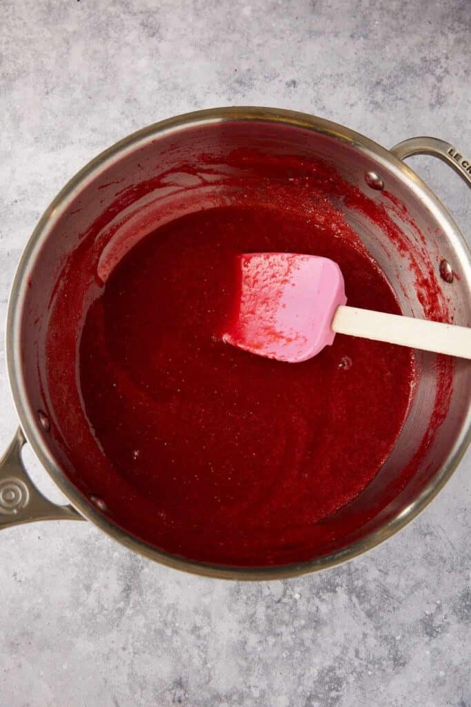Strawberries cooked in a saucepan.