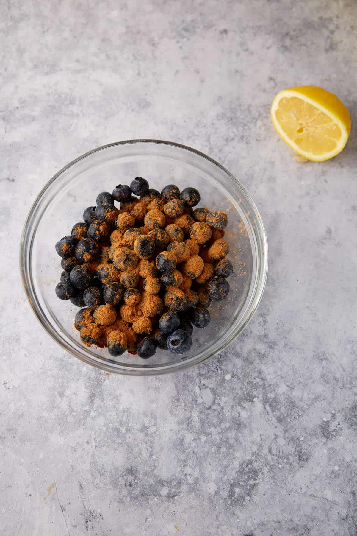 blueberries with lemon and cinnaminn in a bowl.