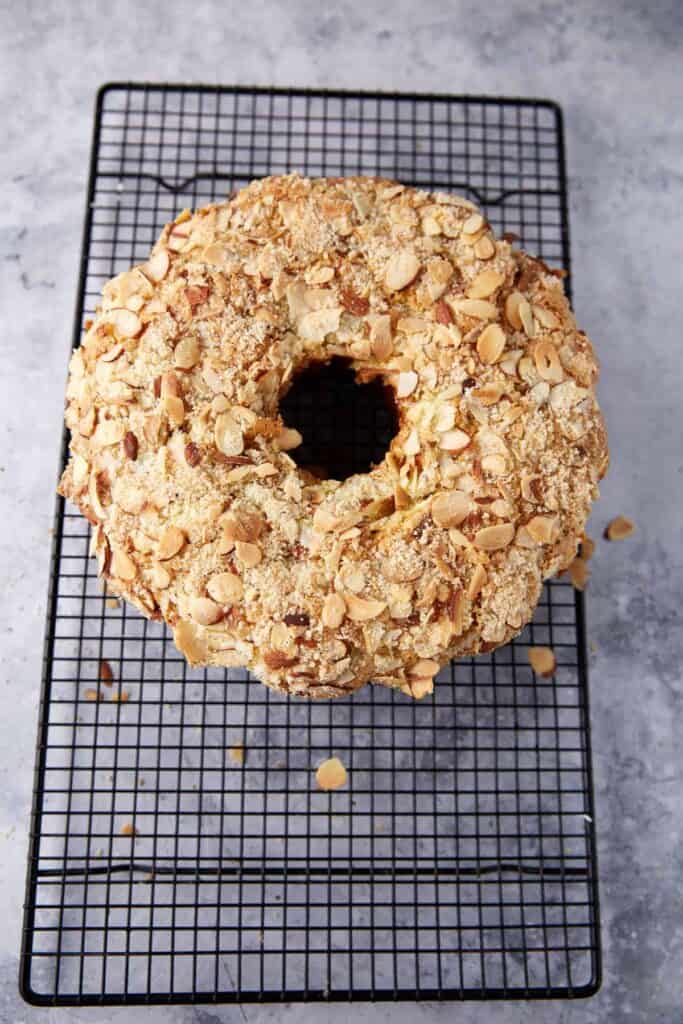 A cream cheese coffee cake coolin on a rack