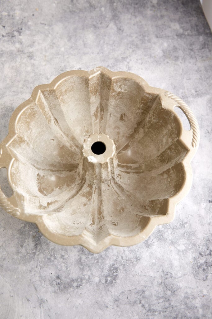 A bundt pan with butter and flour.