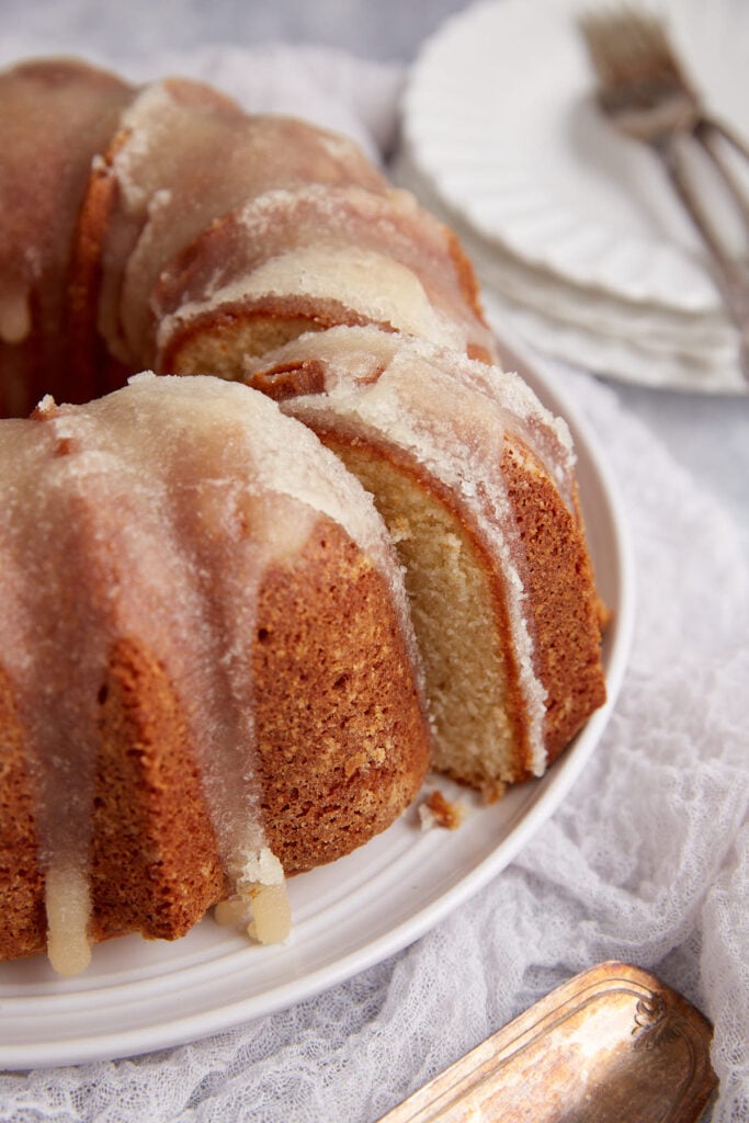 A slice being removed from a bundt cake.