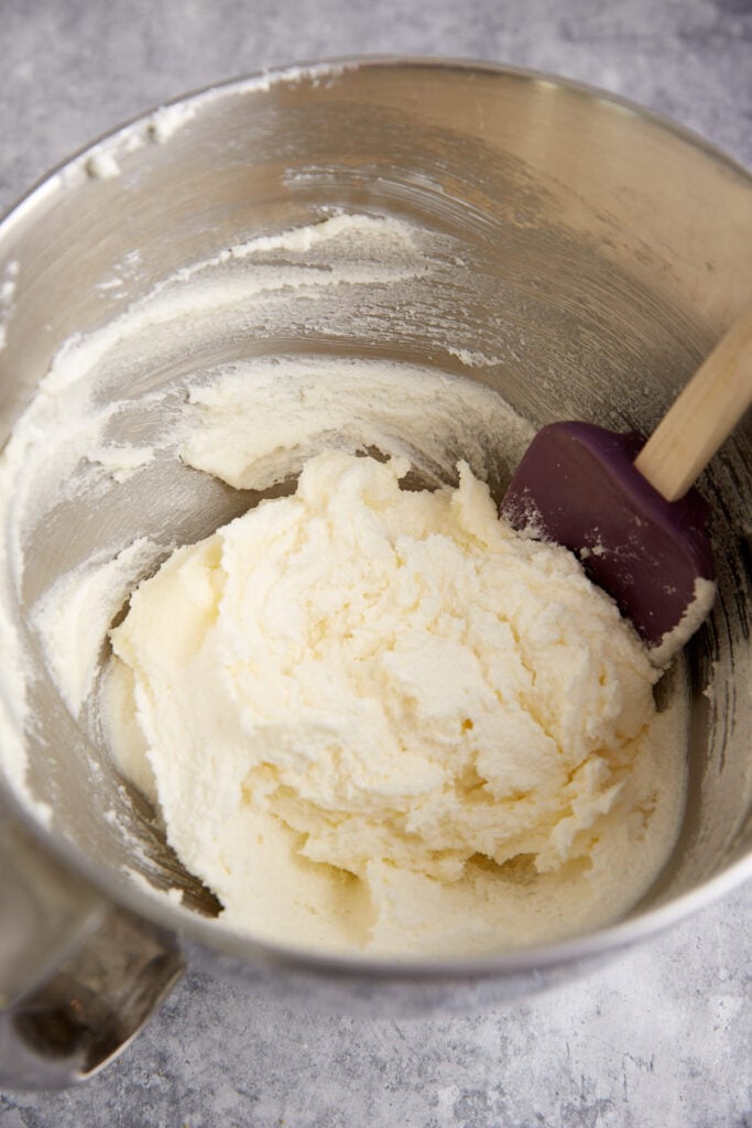 Butter and sugar creamed in a bowl.