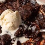 Chocolate cobbler with vanilla ice cream on top.