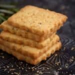 A stack of orange shortbread cookies.