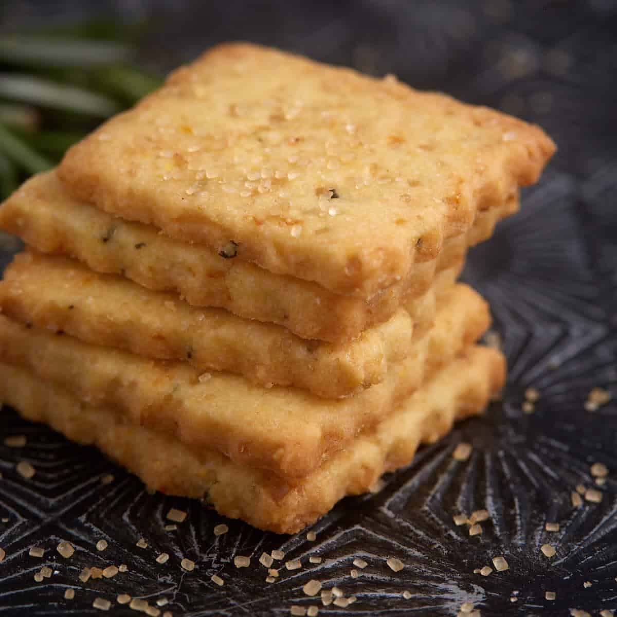 A stack of orange shortbread cookies.