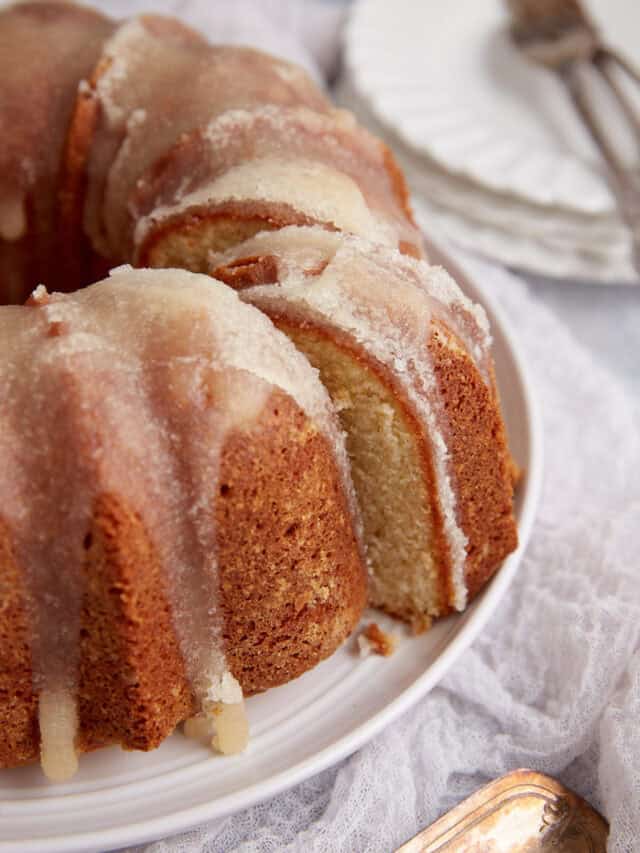 A slice being removed from a bundt cake.