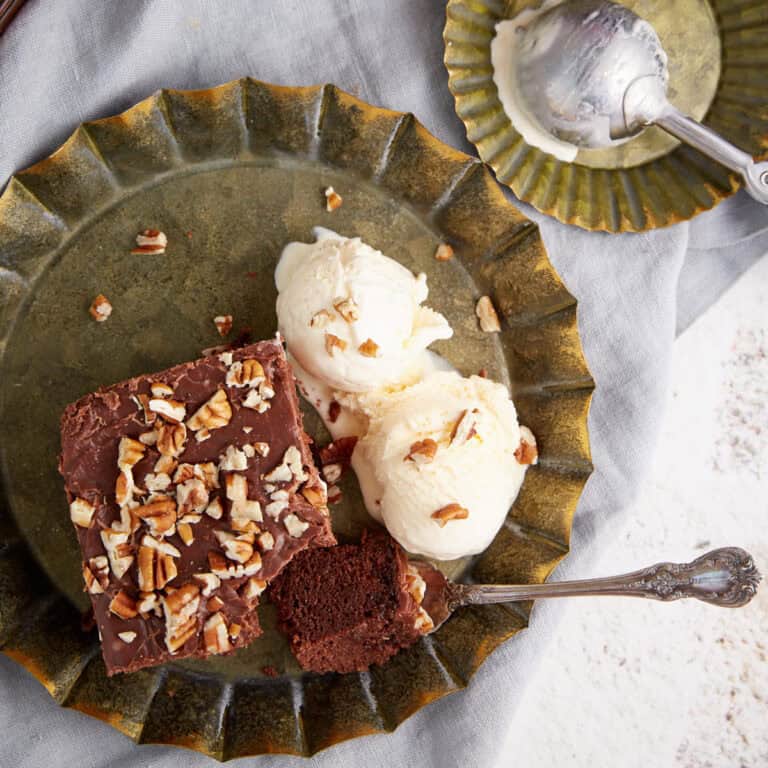 A bite of chocolate cake on a fork.