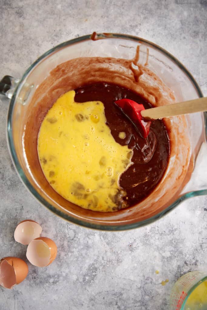 Eggs added to cake batter.