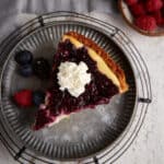 A single slice of blueberry cream cheese pie.