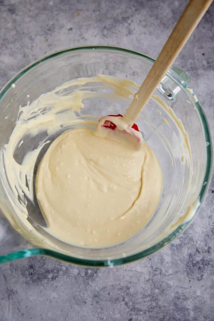 The cream cheese mixture in a mixing bowl.