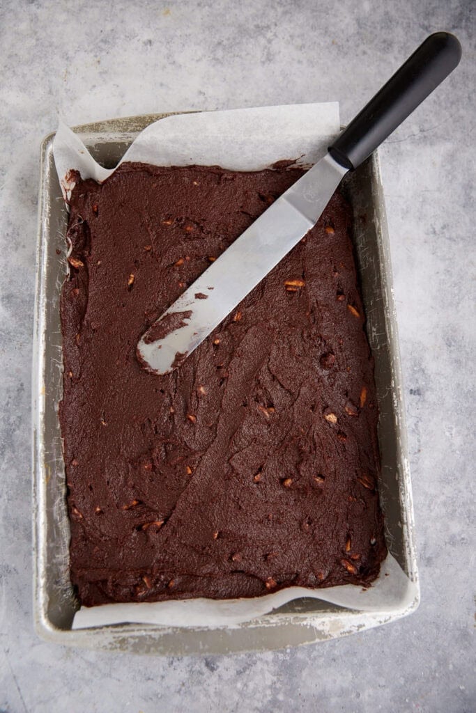Brownie batter in a baking pan.