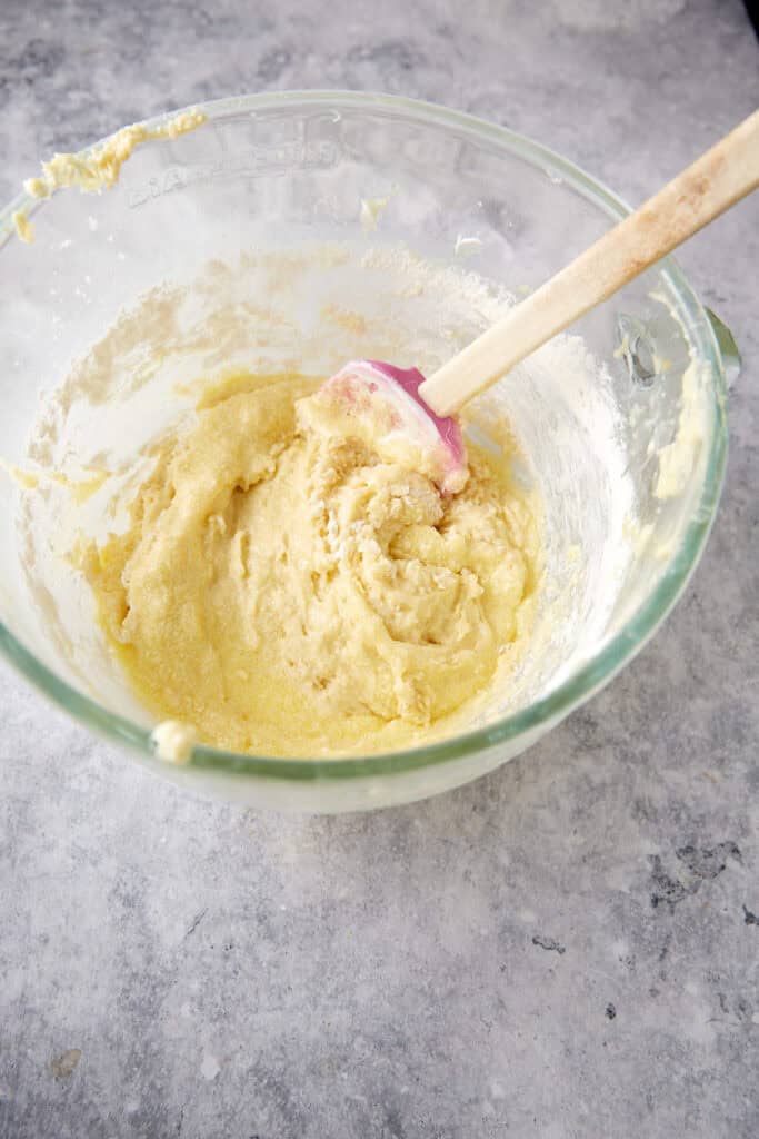 Dry ingredients added to cake batter.
