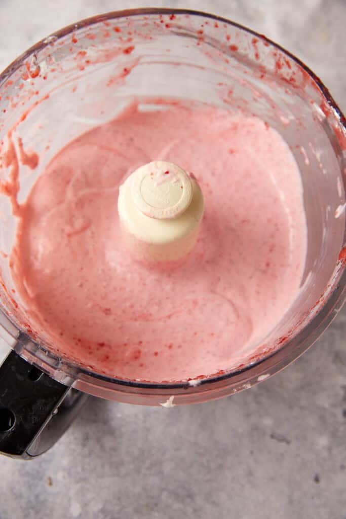 sour cream and strawberries combined in a food processor.