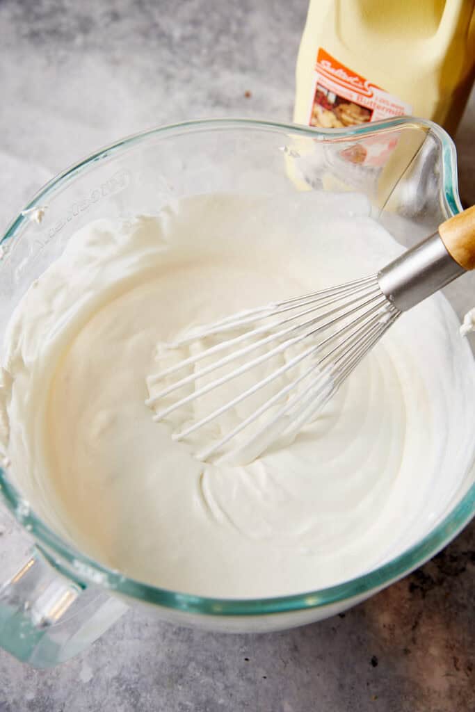 Buttermilk added to whipped cream.