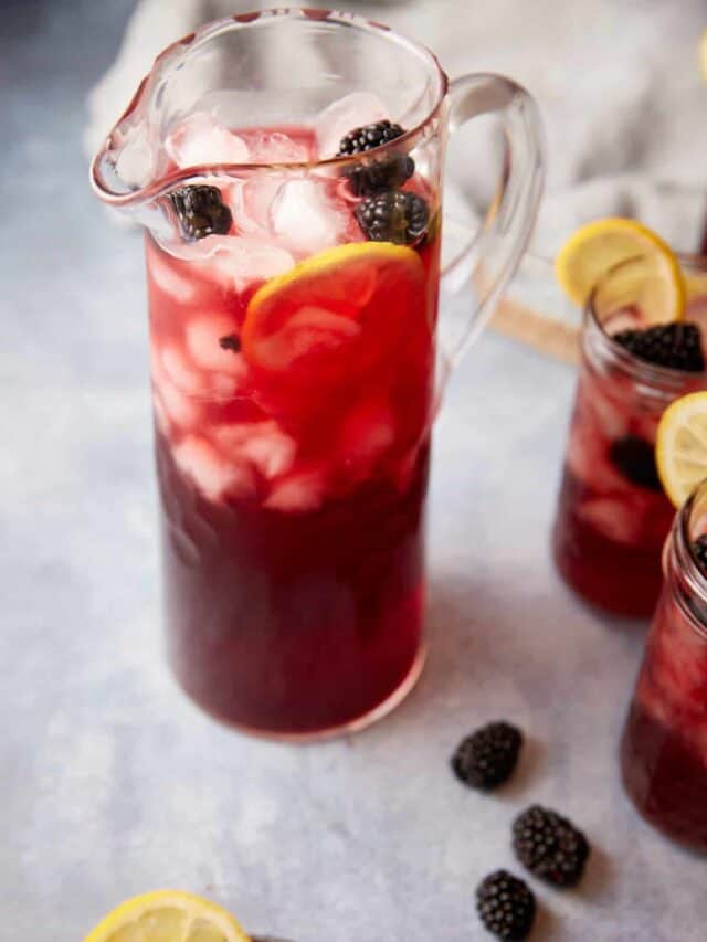 A pitcher of blackberry iced tea.
