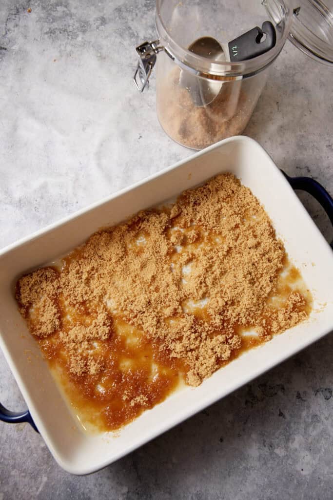 Brown sugar and butter in the bottom of a casserole dish.