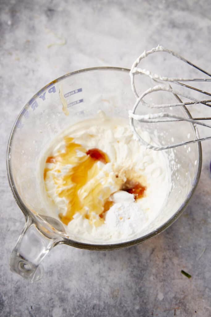 Whipped cream with honey and powdered sugar.