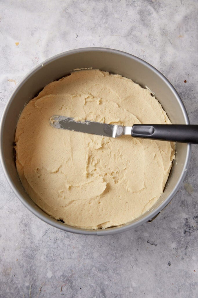 Cake batter in a springform pan.