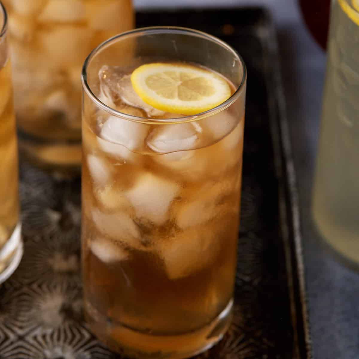 A glass of lemonade with iced tea.