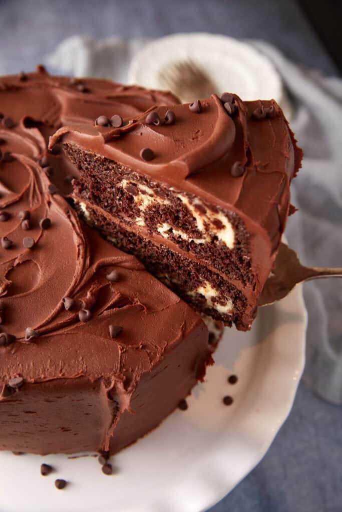 A slice of chocolate cream cheese cake.