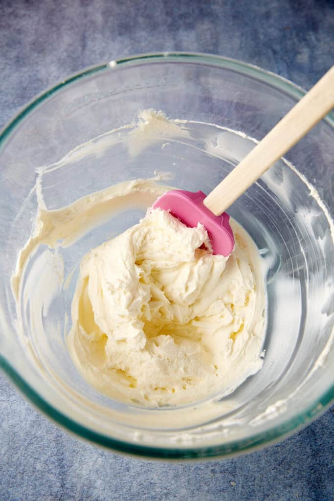 Butter and cream cheese in a mixing bowl. 