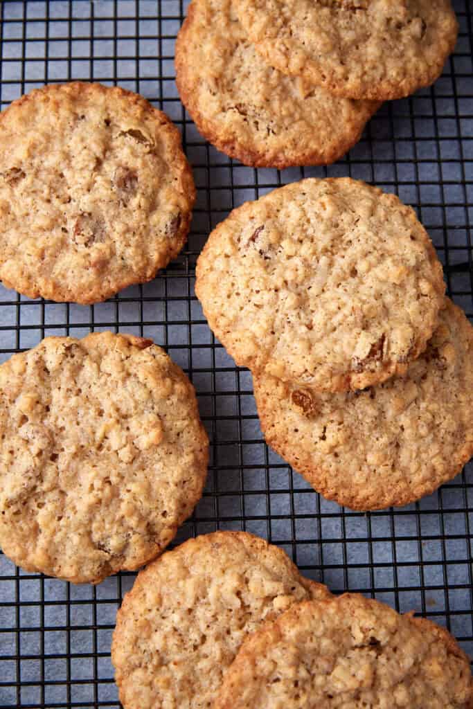 Oatmeal coconut cookies on a baking sheet.