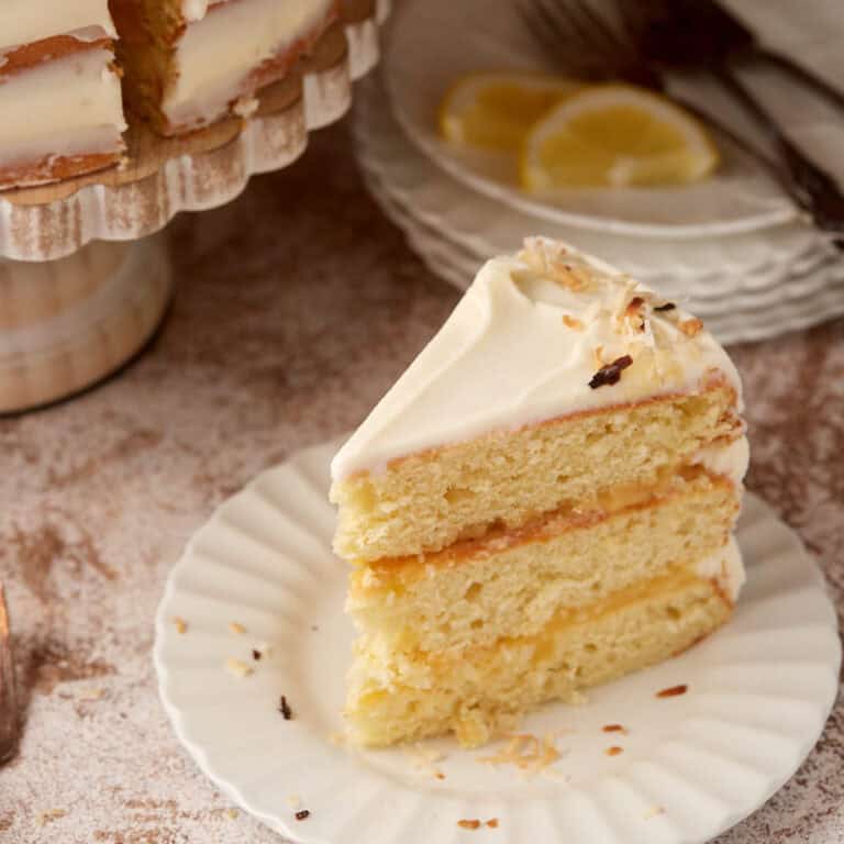 One slice of lemon filled coconut cake.