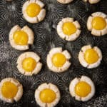 Lemon curd cookies on a tray.