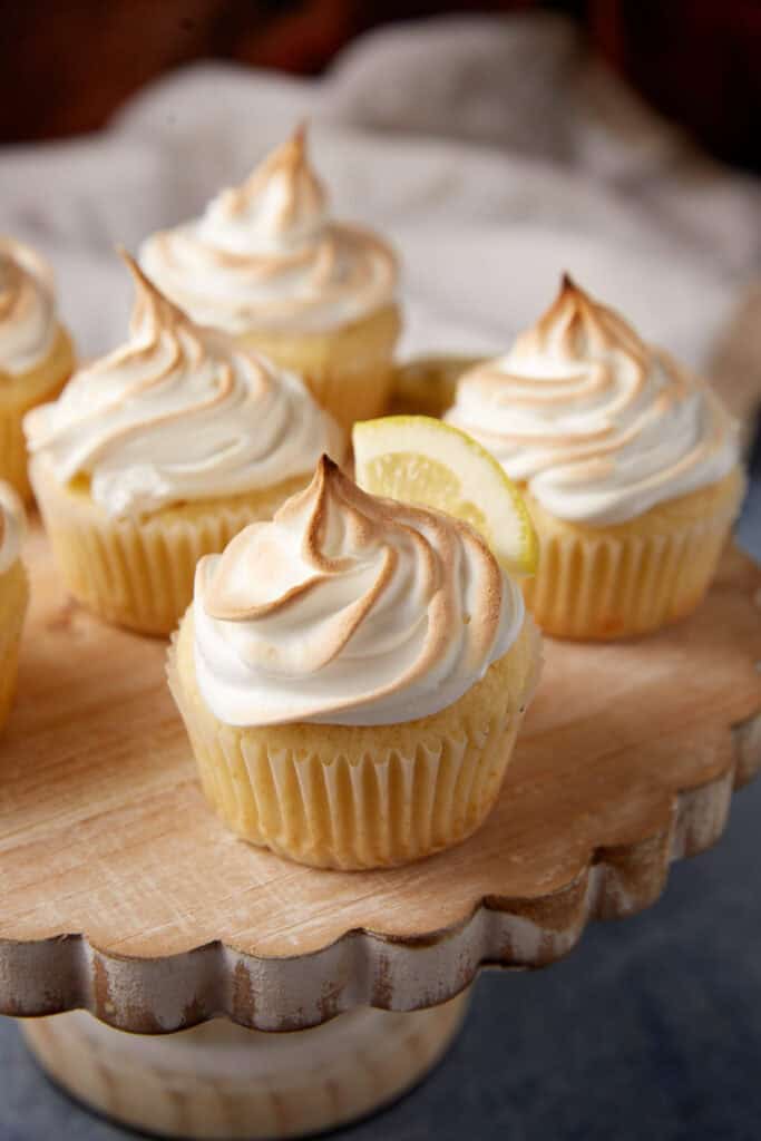 Lemon cupcakes on a cake stand.