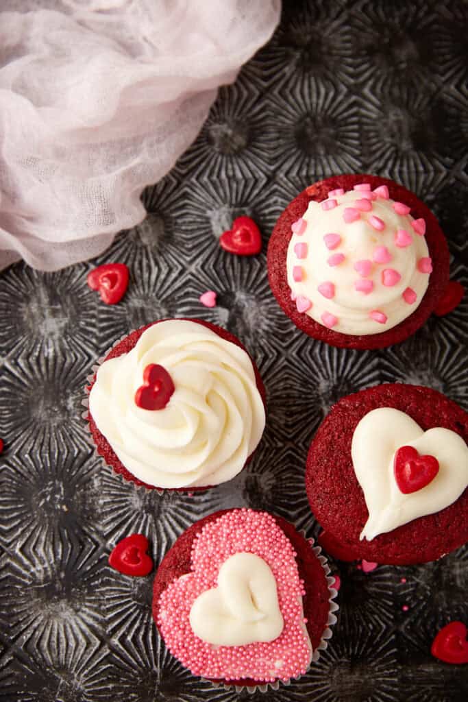 Red velvet cupcakes with Valentines decorations.