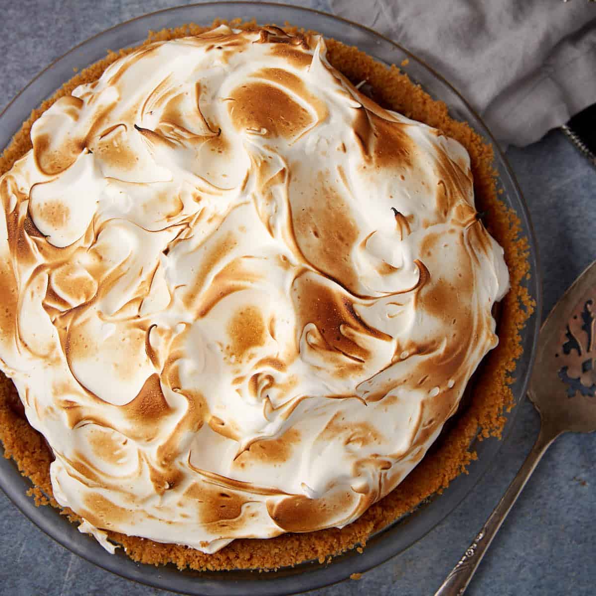A toasted marshmallow frosted pie.
