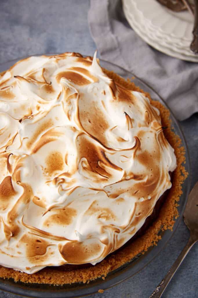 A marshmallow frosting on a chocolate pie.