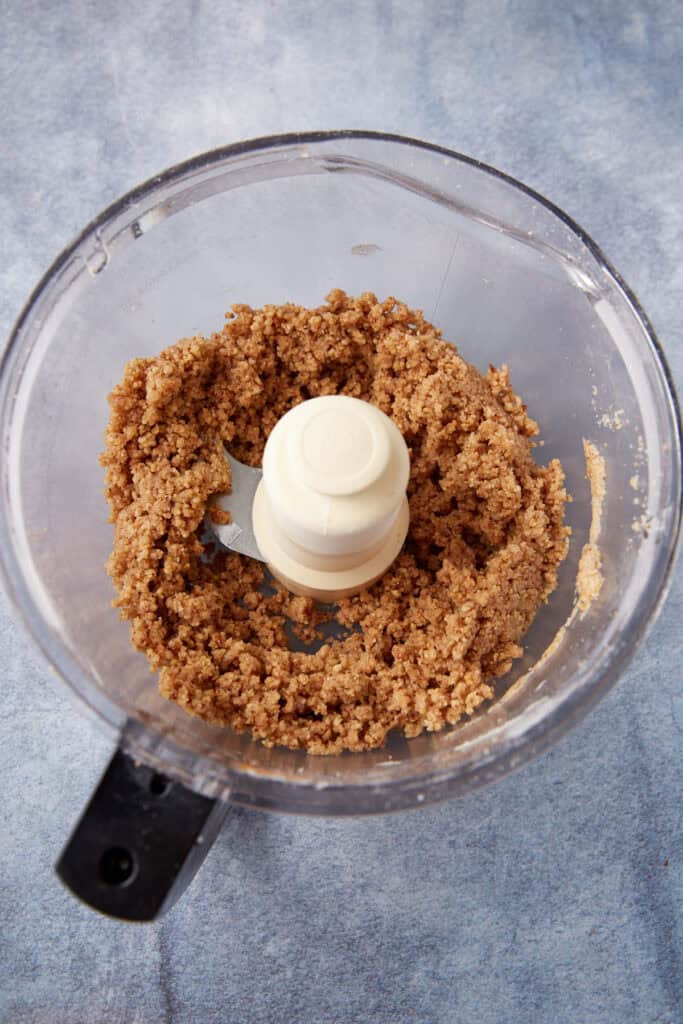 pecan pie crust ingredients in a food processor after adding water
