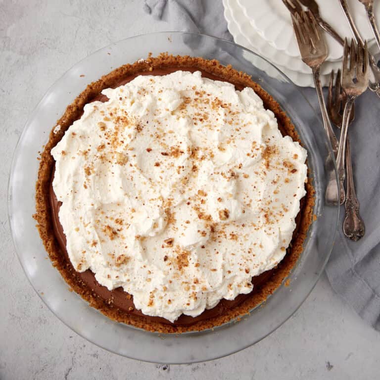 possum pie in a pecan crust on a gray background.