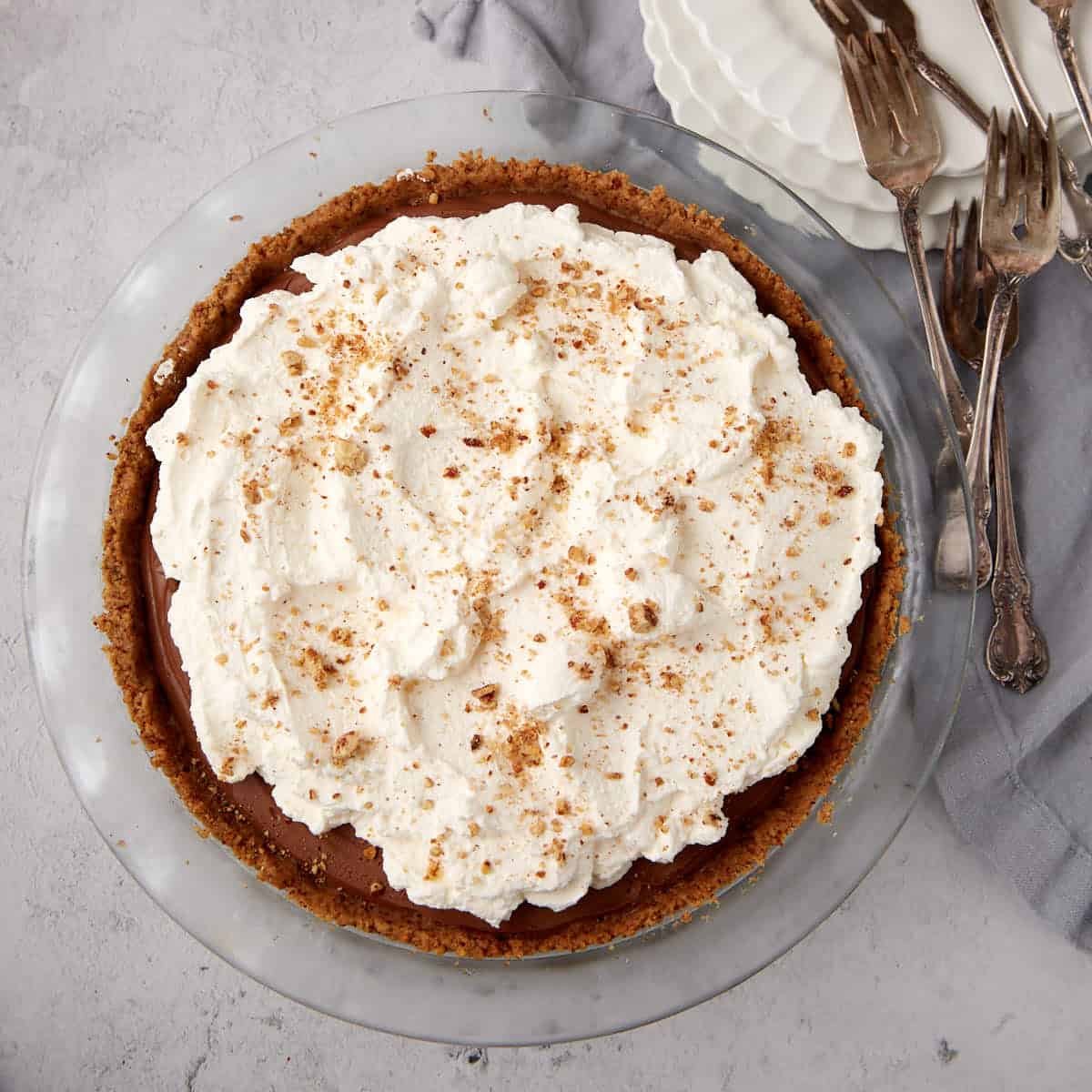 possum pie in a pecan crust on a gray background.