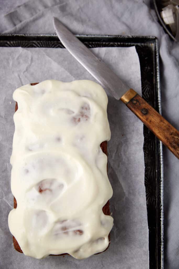 pineapple zucchini bread with pineapple glaze on top. 