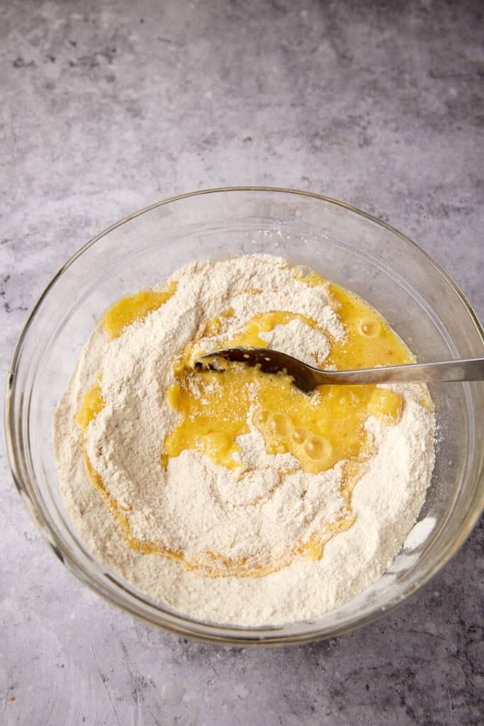 flour mixture with egg mixture being folded in. 