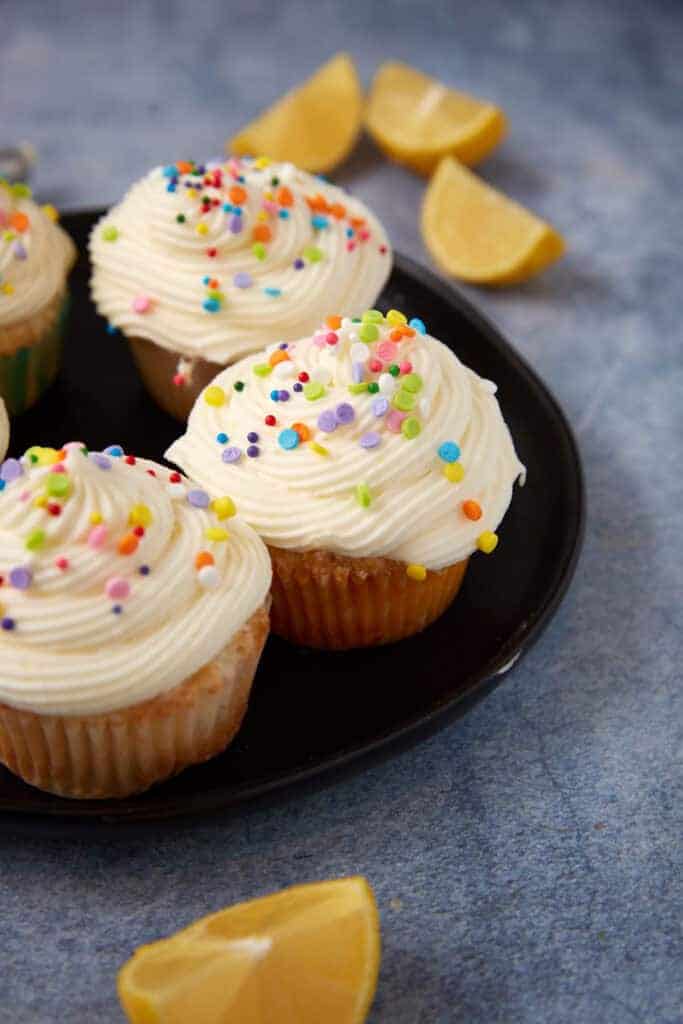 This image has an empty alt attribute; its file name is Lemon-Cupcakes-with-Lemon-Cream-Cheese-Frosting-6-683x1024.jpg