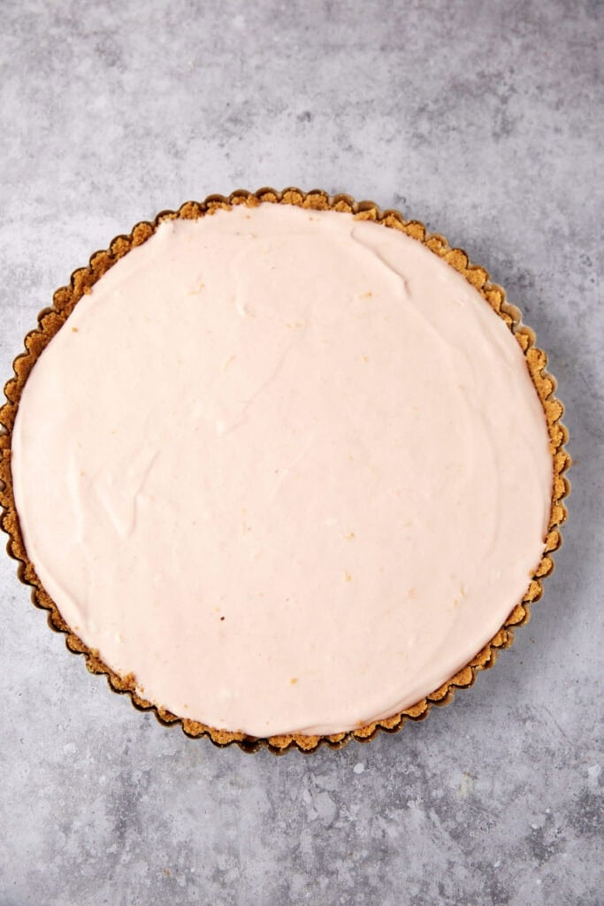 frozen strawberry pie filling inside of the graham cracker crust.